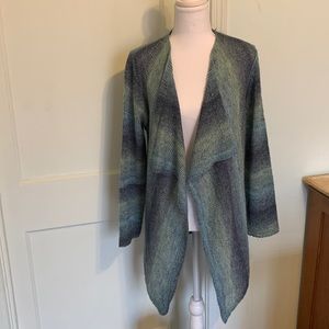 Beautiful, open cardigan is light and airy. Size M. Used.